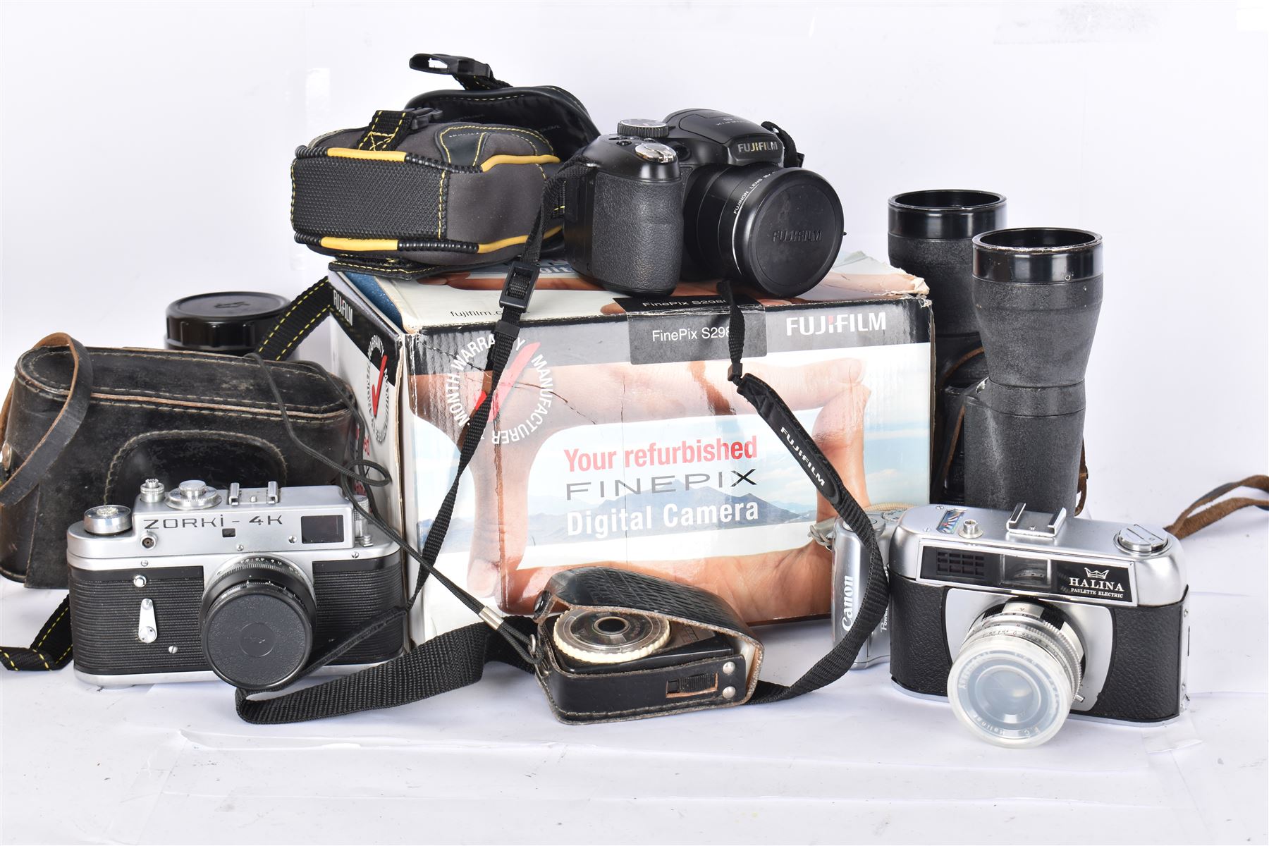 Collection of cameras, including Fujifilm Finepix S2980, boxed, Canon Powershot A540, Zorki 4K, etc together with a pair of Lieberman & Gortz binoculars