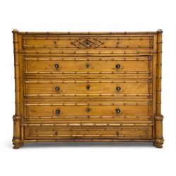 Victorian pine and simulated bamboo chest, fitted with five drawers, the drawer fronts decorated with applied simulated bamboo mounts and turned ebonised handles, on turned front feet