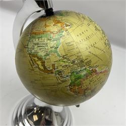 Art Deco style world globe with chrome aeroplane finial and mounts, H31cm