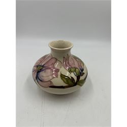 Moorcroft squat vase, in Hibiscus pattern on a white ground, H13cm 