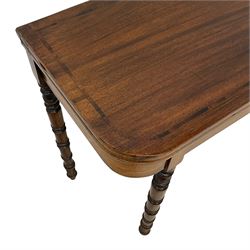 Early 19th century mahogany tea table, rectangular fold-over top with rounded corners, inlaid with mahogany banding, the plain frieze with mahogany stringing, raised on gate-leg action ring turned supports