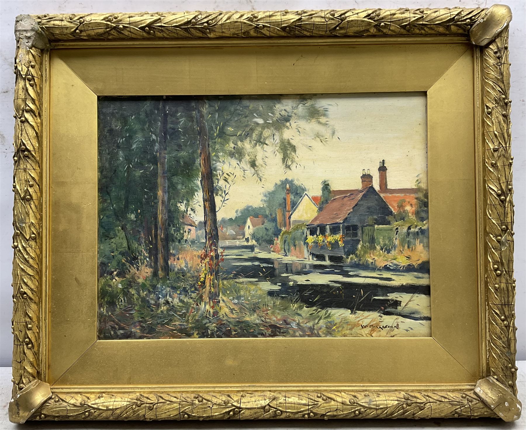 William Bagnall Gelder (British 1869-1929): Riverside Cottages, oil on panel signed 29cm x 40cm