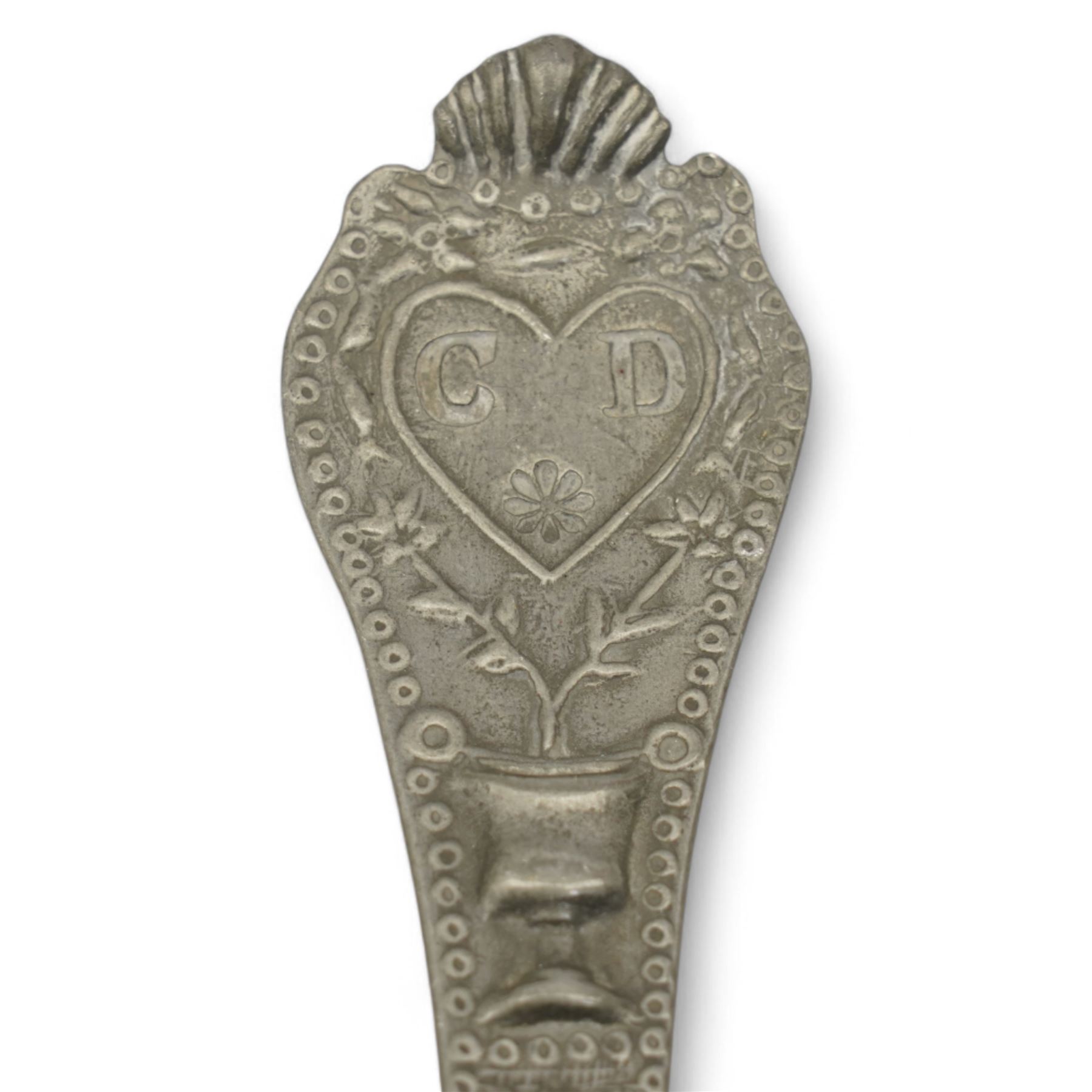 Four 19th century Dutch pewter trifid spoons by Hendrik Kamphof, the shell relief cast finial decorated with a vase of flowers surrounding a heart with the initials 'LF' to two and 'CD' to the two others, Crowned rose with the initials 'HK' struck on the back, L19cm, together with other Dutch pewter spoons and shallow bowl, the base inscribed 'DAM', D33.5cm 