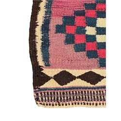 Turkish Anatolian lilac ground kilim rug, the field decorated with three columns of geometric lozenges, enclosed by plain guard stripes 