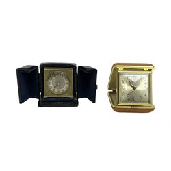 Two 20th century compact traveling alarm clocks -  in blue case with opening doors and an Equity travel clock, both wound and set from the rear.