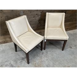 28 x walnut framed dining chairs, upholstered in beige leather