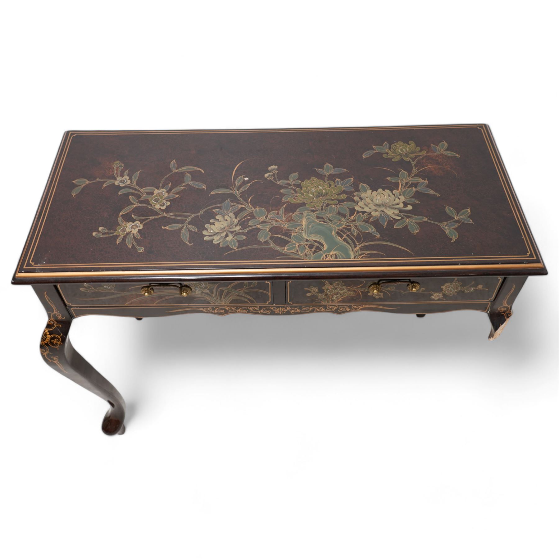 Chinese chinoiserie lacquered side table, fitted with two drawers, on cabriole supports, decorated with painted and gilt floral scenes