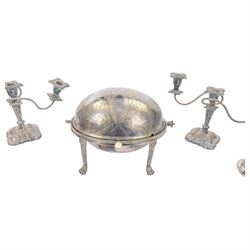 Walker and Hall turnover dish, engraved throughout with foliate decoration, with ivorine handle and upon four paw feet, together with a pair of silver plated candelabra and a pair of silver plated candlesticks, tallest H20cm