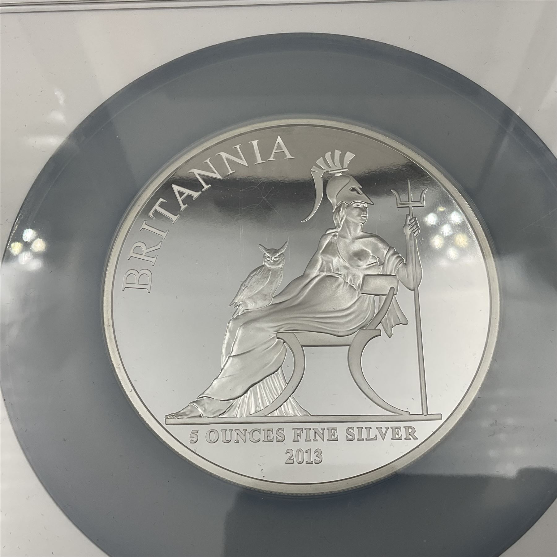 The Royal Mint United Kingdom 2013 'Britannia First Strike' five ounce fine silver proof coin, encapsulated and graded by NGC 'First Releases PF 69 Ultra Cameo', cased with certificates