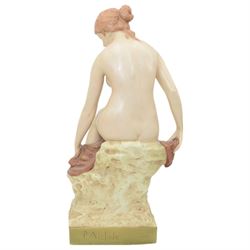 Large early 20th century Royal Dux figure of a nude female bather, seated upon a rocky base, model no. 1379, applied triangle mark beneath, H49cm 