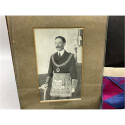 Quantity of Masonic regalia to include aprons, medals, sash etc, housed in black travelling bag