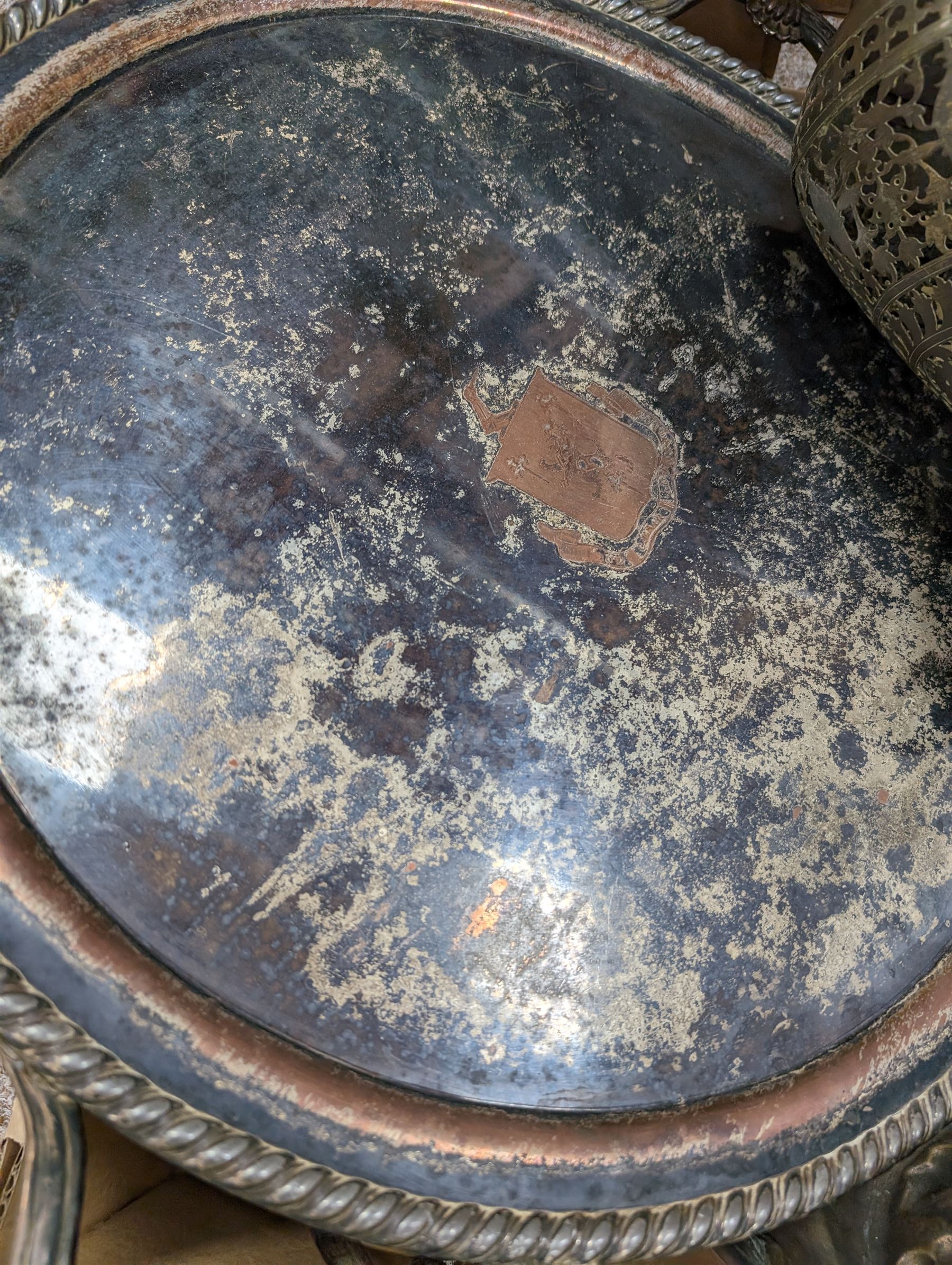 Large silver plated footed twin handled tray, engraved with crest to centre, together with a copper mould and other metalware 