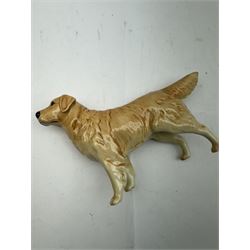 Four Beswick figures, comprising bay horse, golden retriever dog no 2287 and two donkeys no 1364