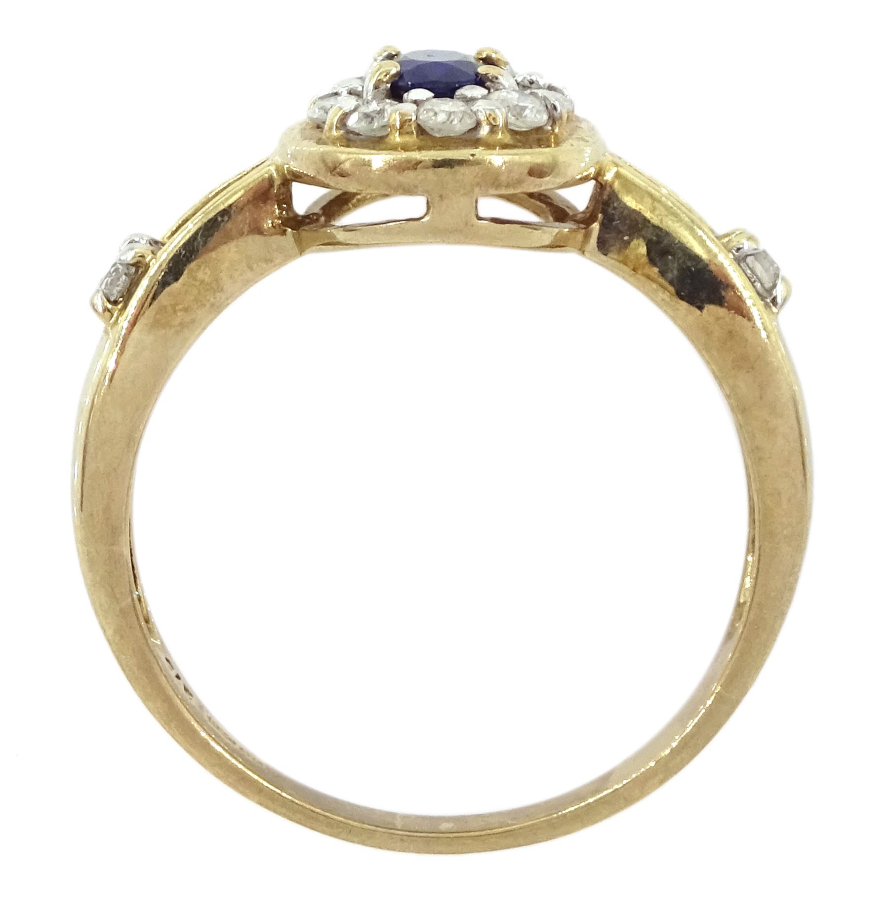 9ct gold oval cut sapphire and round brilliant cut diamond cluster ring, with diamond set shoulders, hallmarked