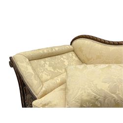 Victorian design walnut framed settee, shaped camelback with gadroon carved edge and central feather motif, upholstered in cream damask fabric with scrolling floral pattern, S-scroll arm facias carved with flower head and curled leaves, feather carved C-scroll splayed feet 