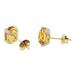 Pair of 14ct gold citrine and diamond stud earrings, oval briolite cut citrines, each claw set with two round brilliant cut diamonds, stamped 585