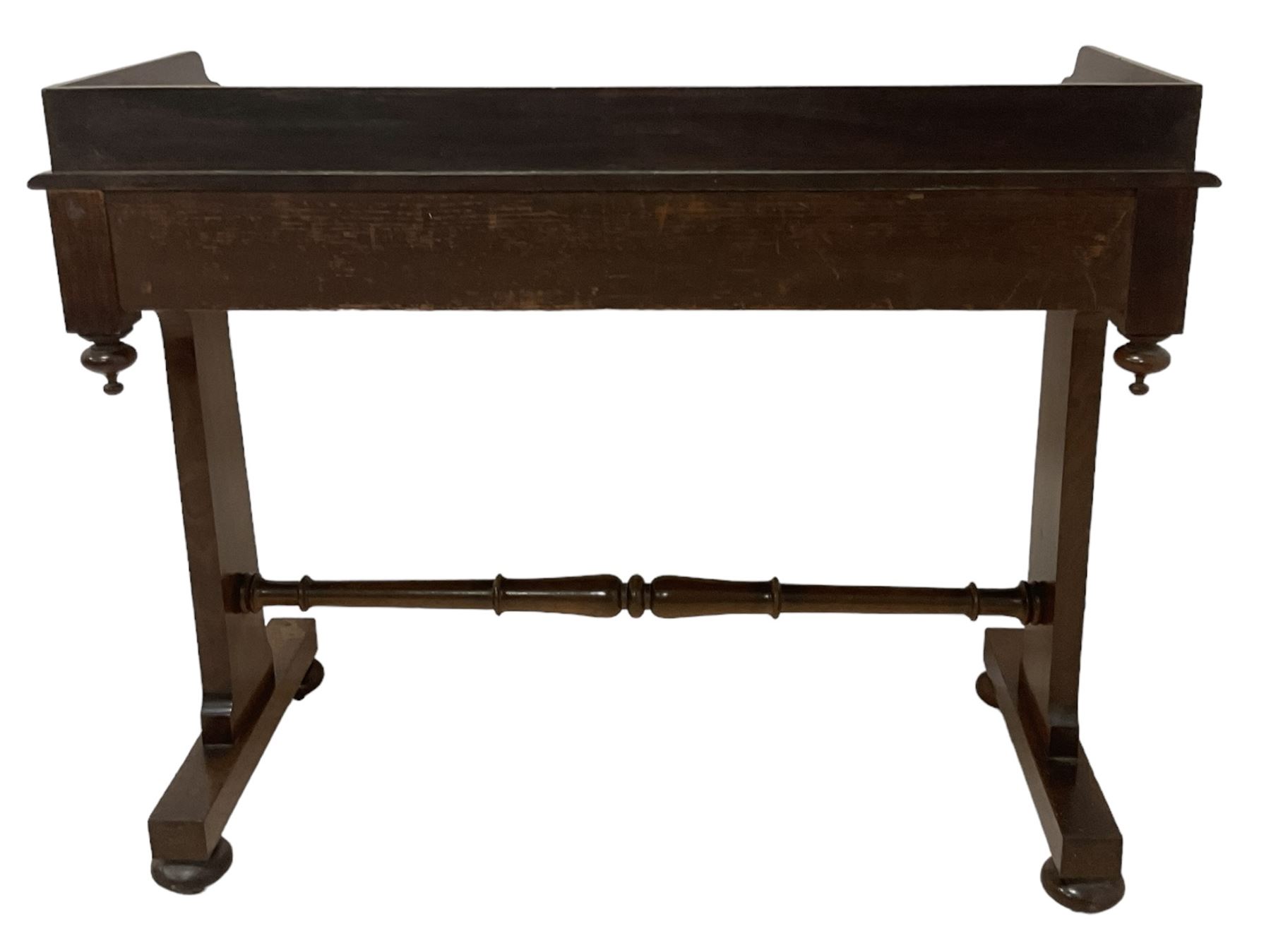 Victorian mahogany washstand, three-quarter raised gallery back, rectangular top with over two drawers, on shaped end supports united by ring-turned stretcher