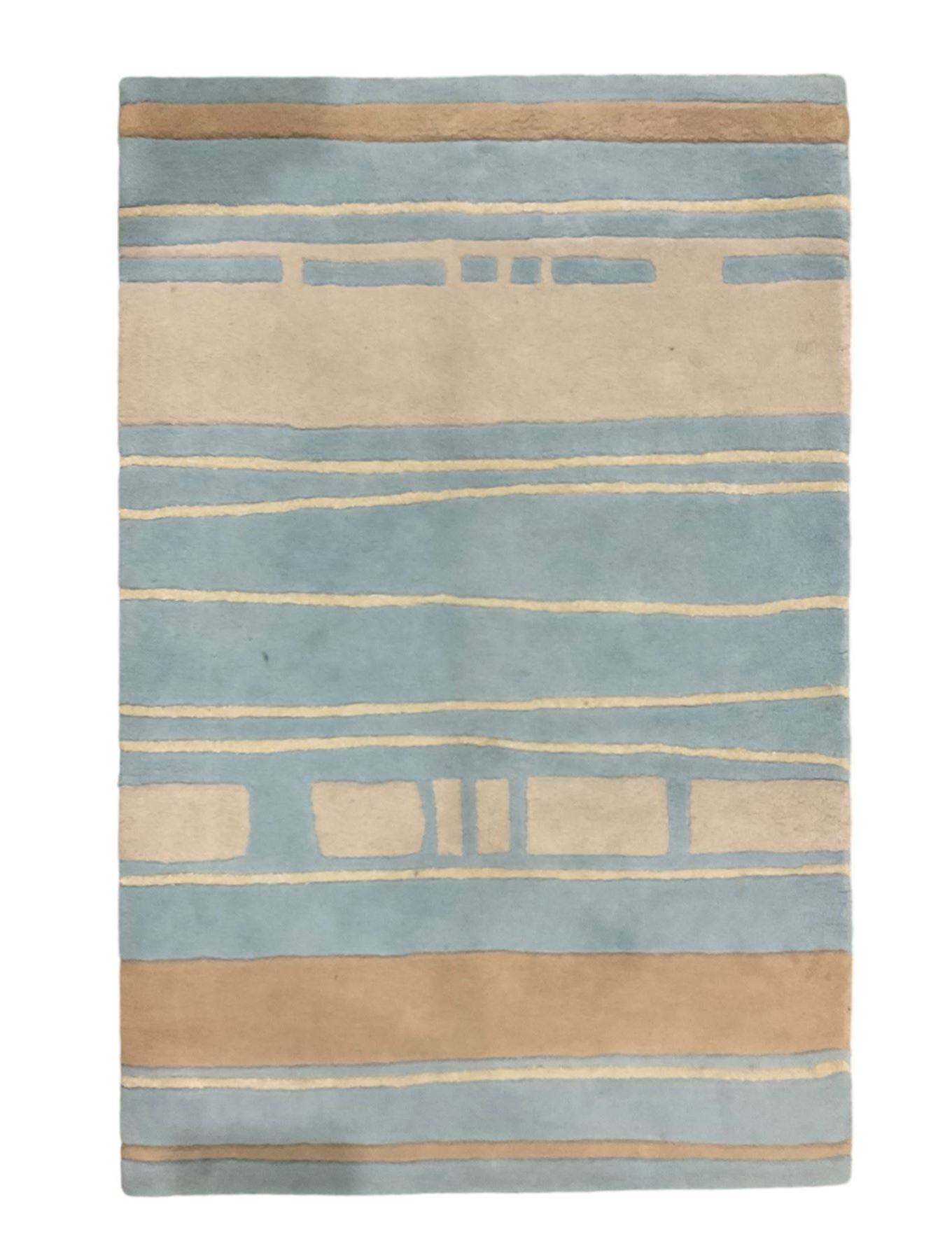 Contemporary pale indigo and beige ground rug, decorated with alternating stripes and geometric shapes