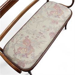 Early 20th century beech framed and bentwood bench, shaped cresting rail over rolled arms, upholstered seat in floral pattern fabric, on turned supports