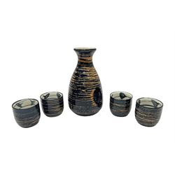 Japanese sake set, comprising bottle and four cups