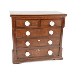 Wooden table top chest, two short over three long drawers, with ceramic handles, H42cm, L46cm 