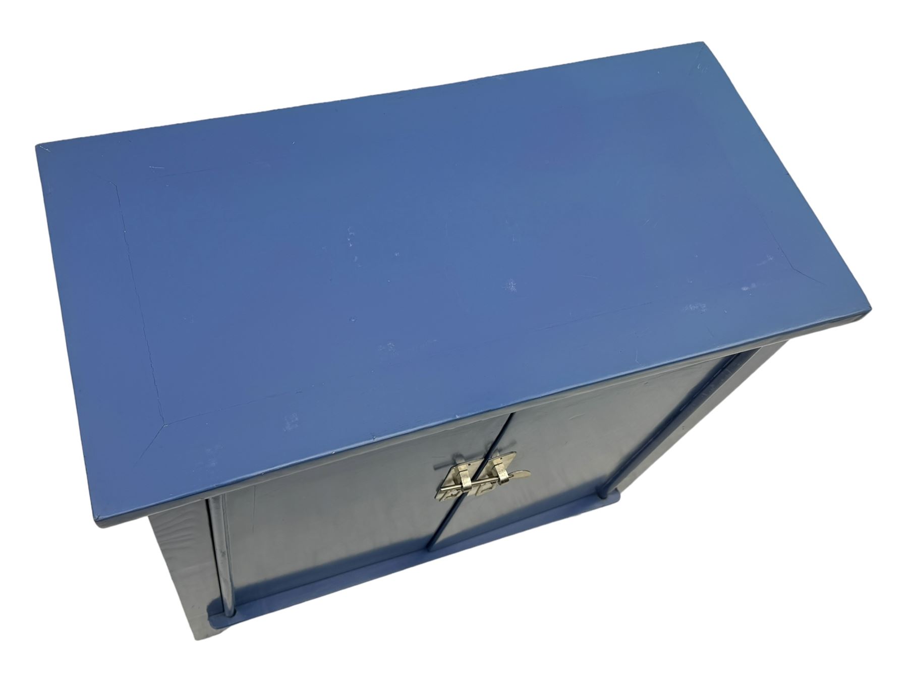 20th century Chinese blue lacquered cabinet, rectangular top over double doors with brass latch, interior fitted with shelves, on square supports