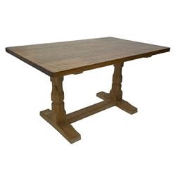 Mouseman - oak dining table, rectangular adzed top with rounded corners, octagonal pillar supports on sledge feet united by floor stretcher, carved with mouse signature, by the workshop of Robert Thompson, Kilburn