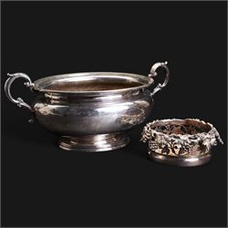 20th century silver-plated bottle coaster with grape vine decoration, cut glass claret jug with silver-plated mounts, H30cm and an early 20th century Elkington silver plate soup tureen, lacking cover 