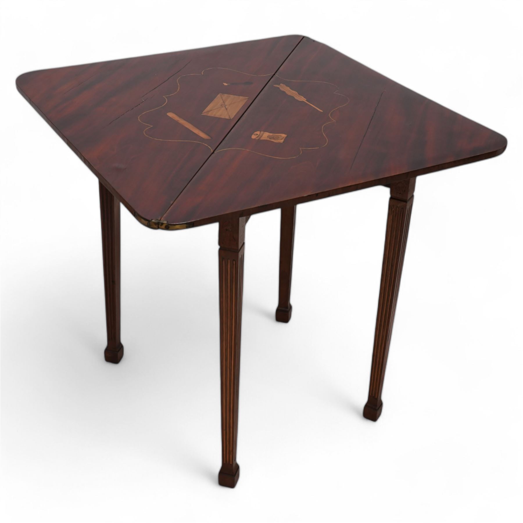 19th century walnut and Dutch marquetry triangular table, the triangular fold-over top reveals a panel of inlaid writing instruments, on square tapering and fluted supports terminating to spade feet 