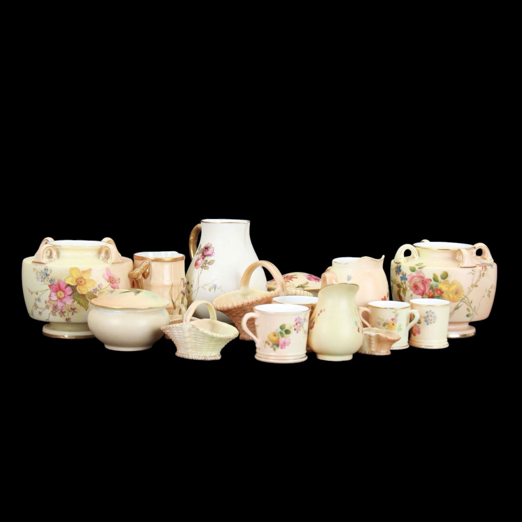 Collection of Royal Worcester blush ivory ceramics, including a graduating set of posey baskets, miniature flatback jug, covered jars etc (19) 