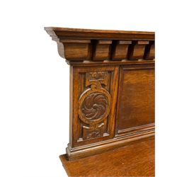 Early 20th century oak sideboard, raised panelled back with foliate carved decoration, rectangular top with gadrooned edge, fitted with two drawers over cupboards with field moulded facias, turned supports joined by stretchers