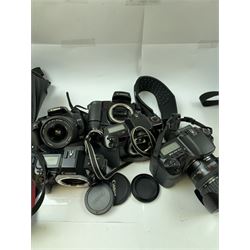 Five Canon EOS cameras, comprising EOS 100 camera body, serial no. GR-70, EOS RT camera body, serial no. 2539432, EOS 350D, serial no. 1330744265, with a Canon EF-S 18-55mm 1:3.5-5.6 II zoom lens, serial no. 1230500053, EOS 10 camera body, serial no. 1274983, and an EOS 10D camera serial no. 1430501397, with a Canon Ultrasonic 72mm EF 28-135mm 1:3.5-5.6 IS zoom lens, serial no. 3402517E