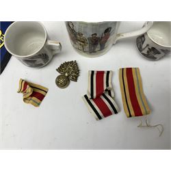 Collection on military items, including John Player & Sons Military Uniforms of the British Overseas, medal ribbon, ceramics and a reproduction metal plaque 