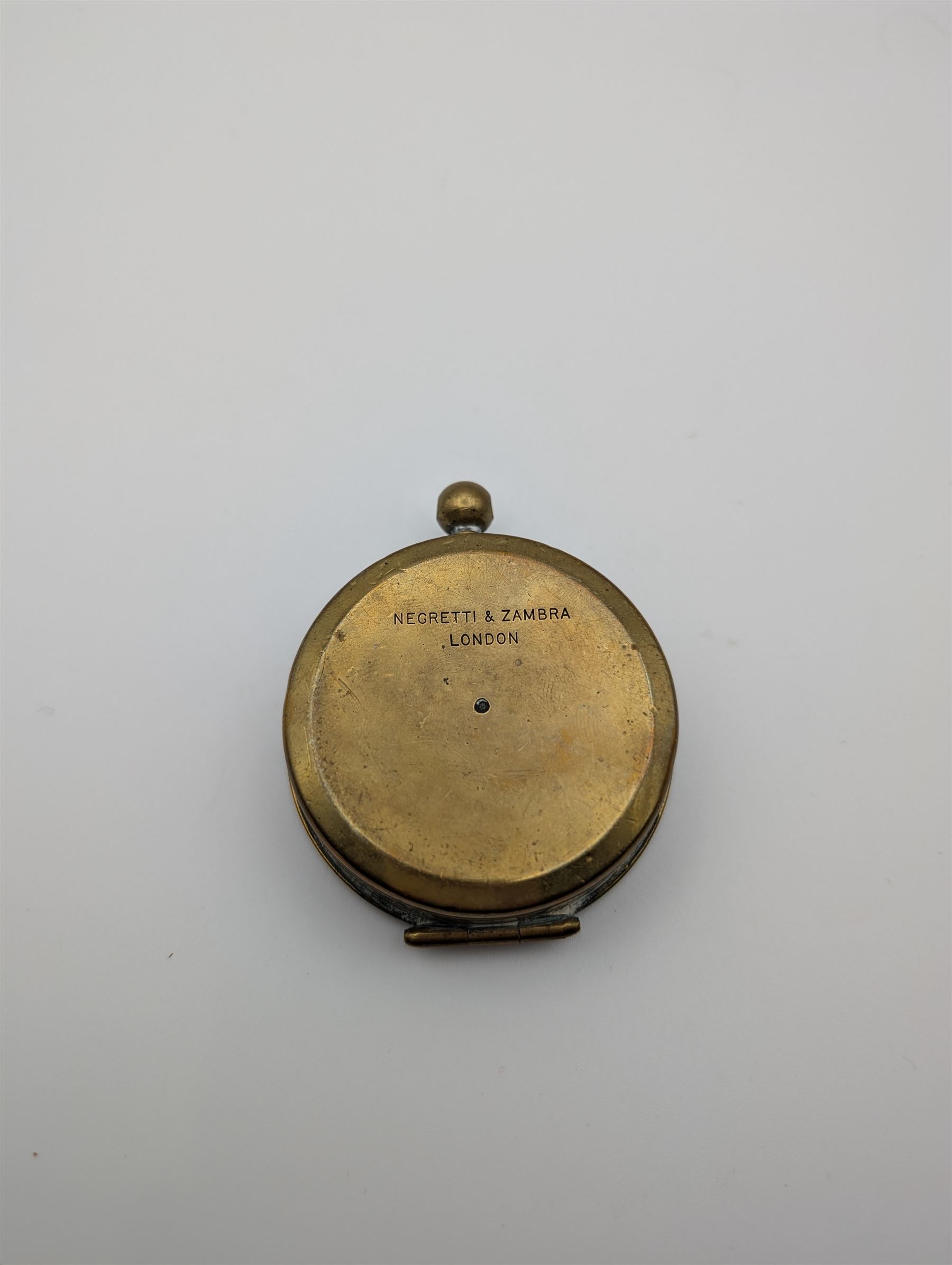 Early 20th century brass pocket compass by Negretti & Zambra, with personal engraving to front cover to 'Trooper E.O Robotham' dated 1900, H7cm