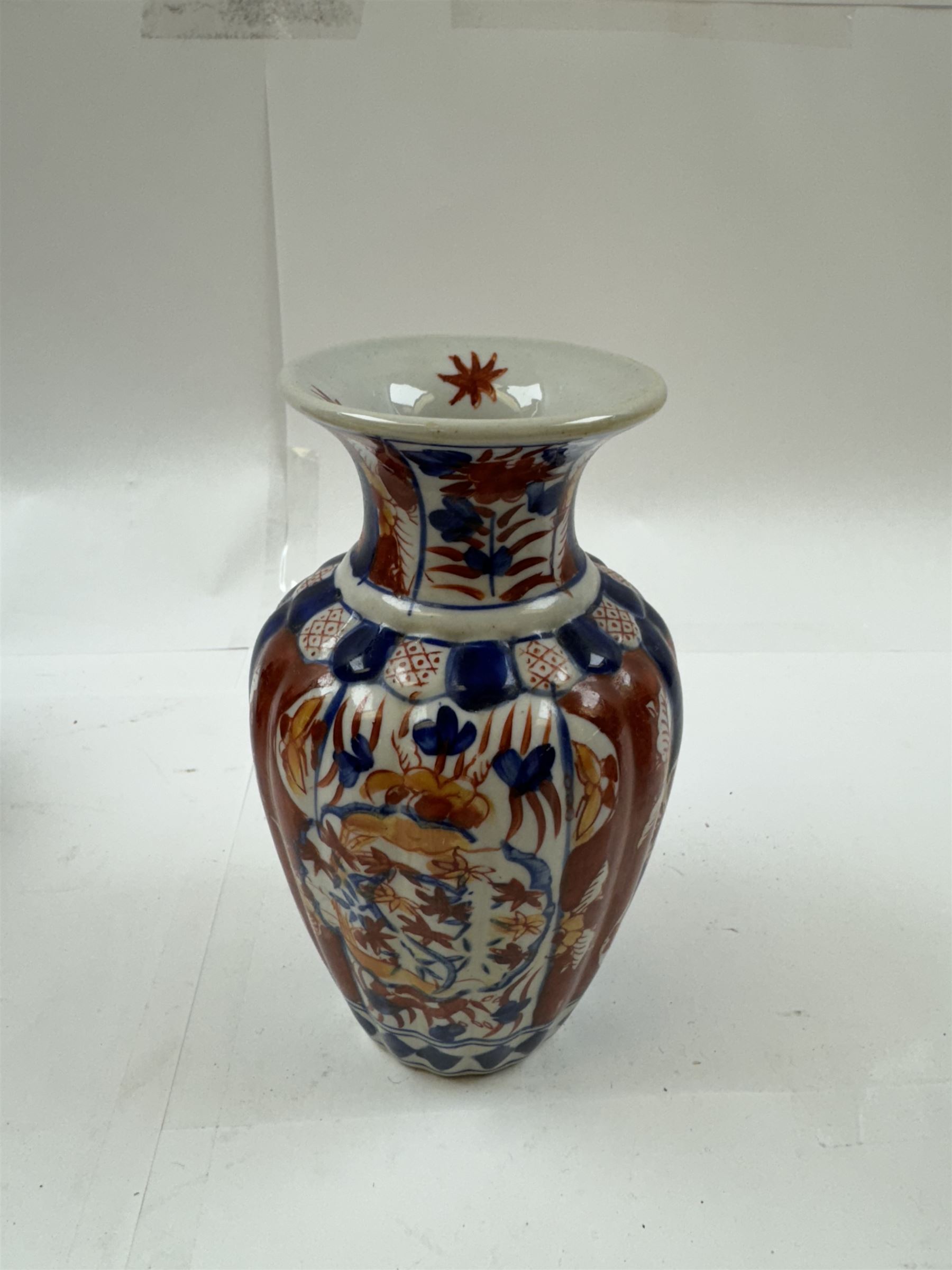 Three pairs of Imari vases, including a pair of baluster form with covers with foo dog finials, tallest H21cm 