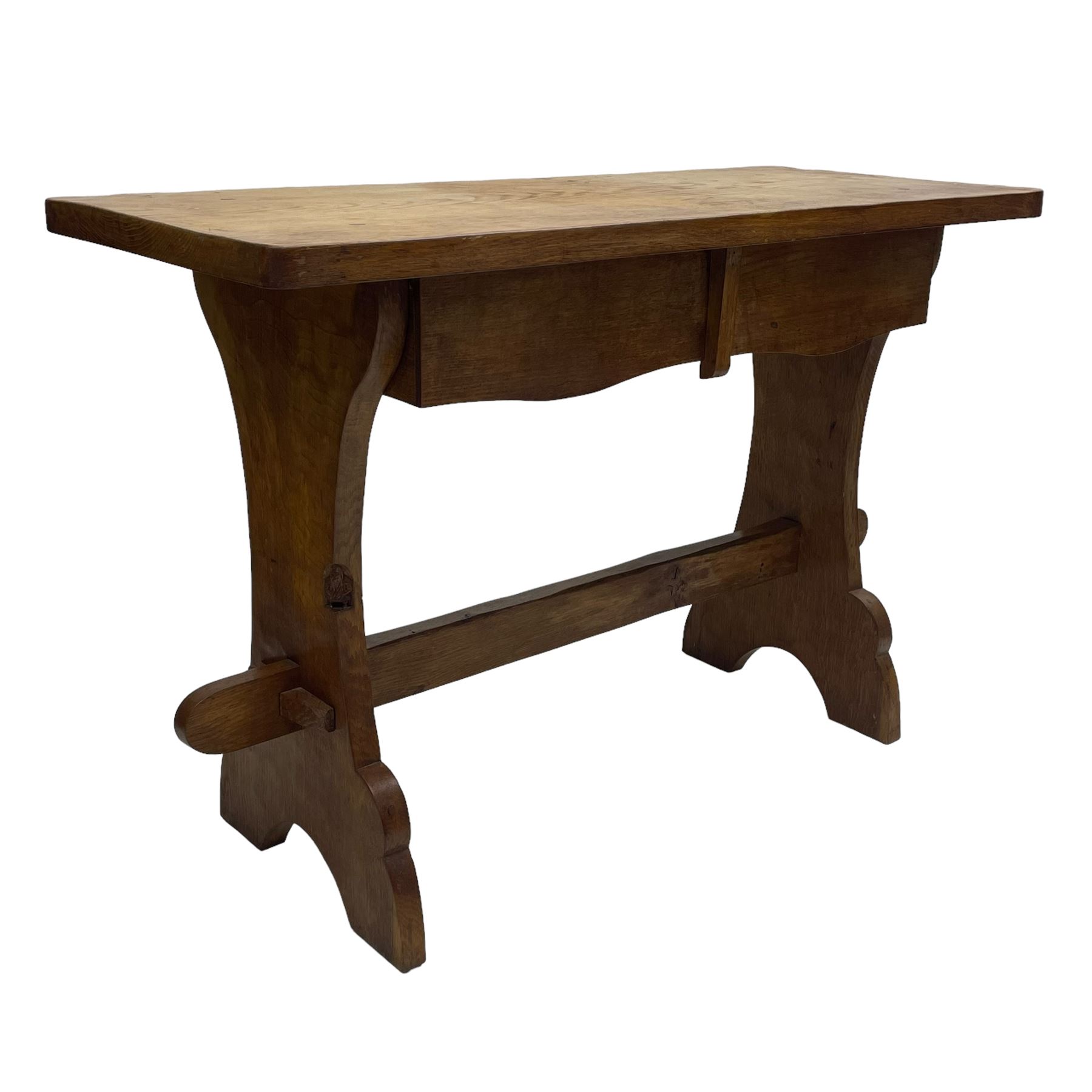 Gnomeman - oak side table, rectangular adzed top over two drawers, on shaped end end supports united by pegged stretcher, carved with gnome signature, by Thomas Whittaker, Littlebeck 