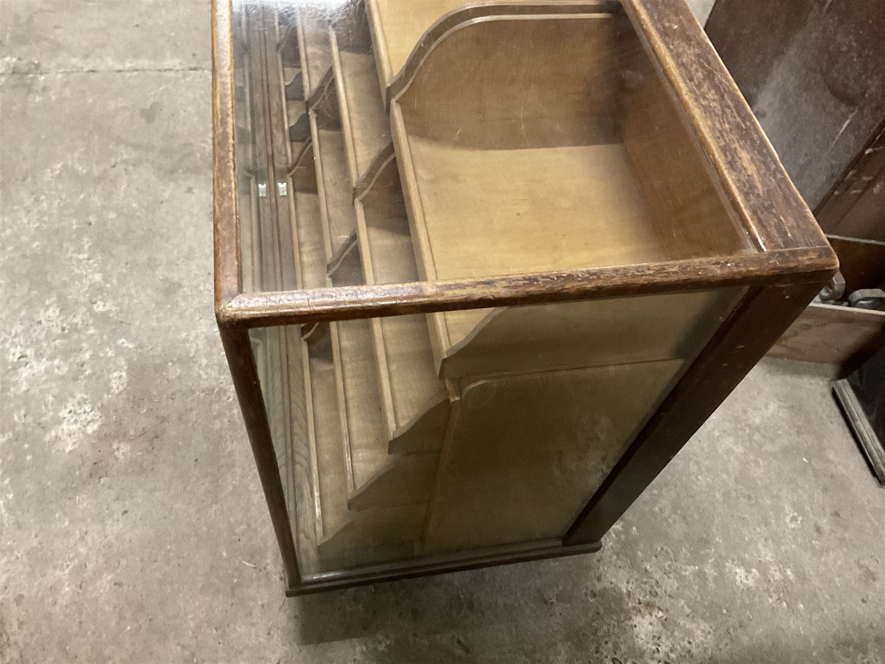 20th century oak and glazed haberdashery shop’s cabinet, glass front and sides, fitted with sixteen graduating drawers  - THIS LOT IS TO BE COLLECTED BY APPOINTMENT FROM THE OLD BUFFER DEPOT, MELBOURNE PLACE, SOWERBY, THIRSK, YO7 1QY