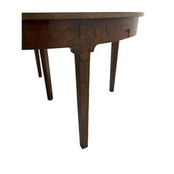 George III mahogany extending dining table, two D-ends with two leaves, on square tapering supports