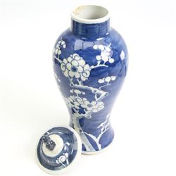 Chinese blue and white prunus pattern vase and cover, H28cm together with a pair of Chinese export style armorial obelisks, H33cm (3)