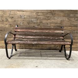 Early 20th century black painted wrought iron and wood slatted garden bench