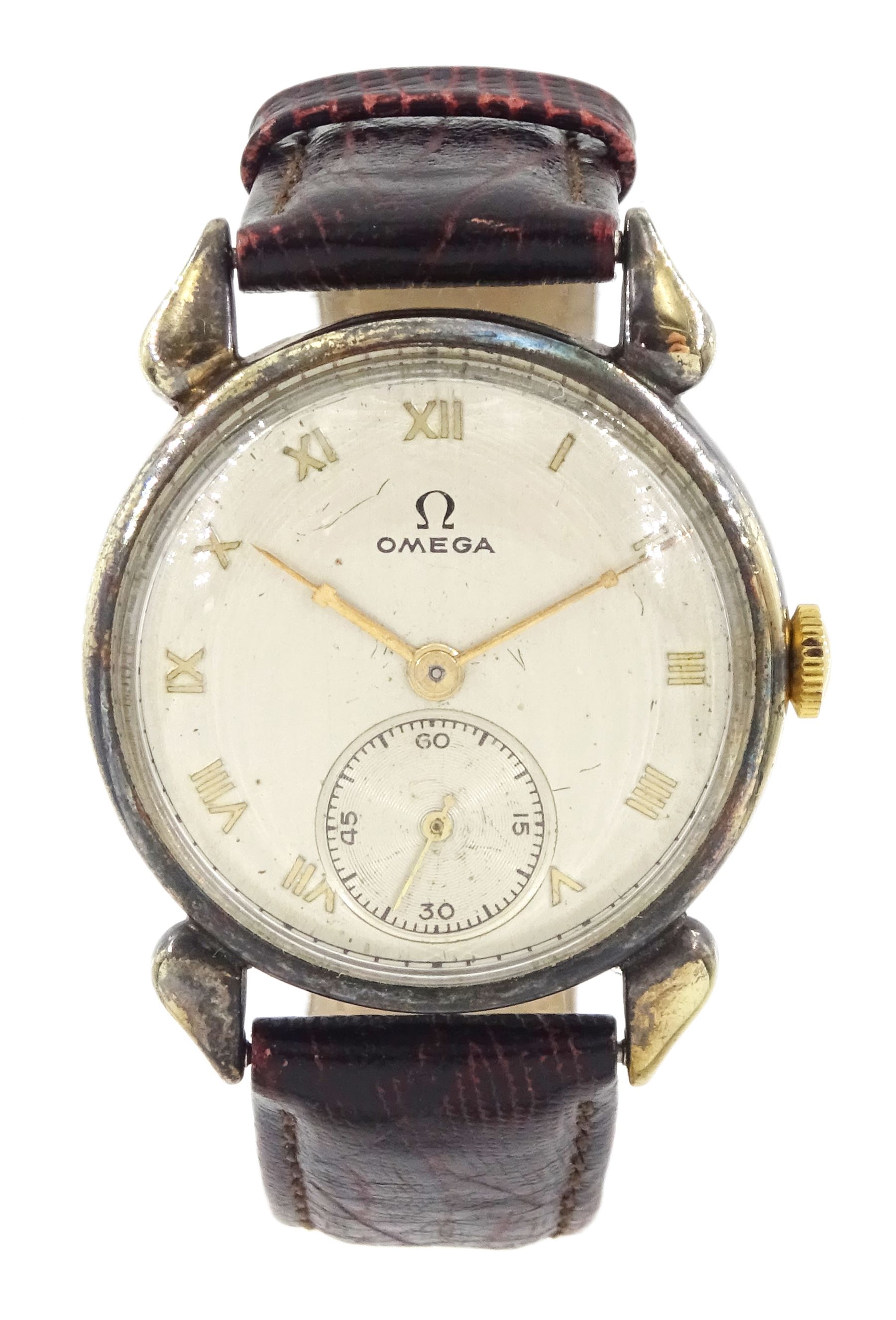 Omega 14K gold filled gentleman's manual wind wristwatch, silvered dial with Roman numerals and subsidiary seconds dial, case No. 13000, on brown leather strap