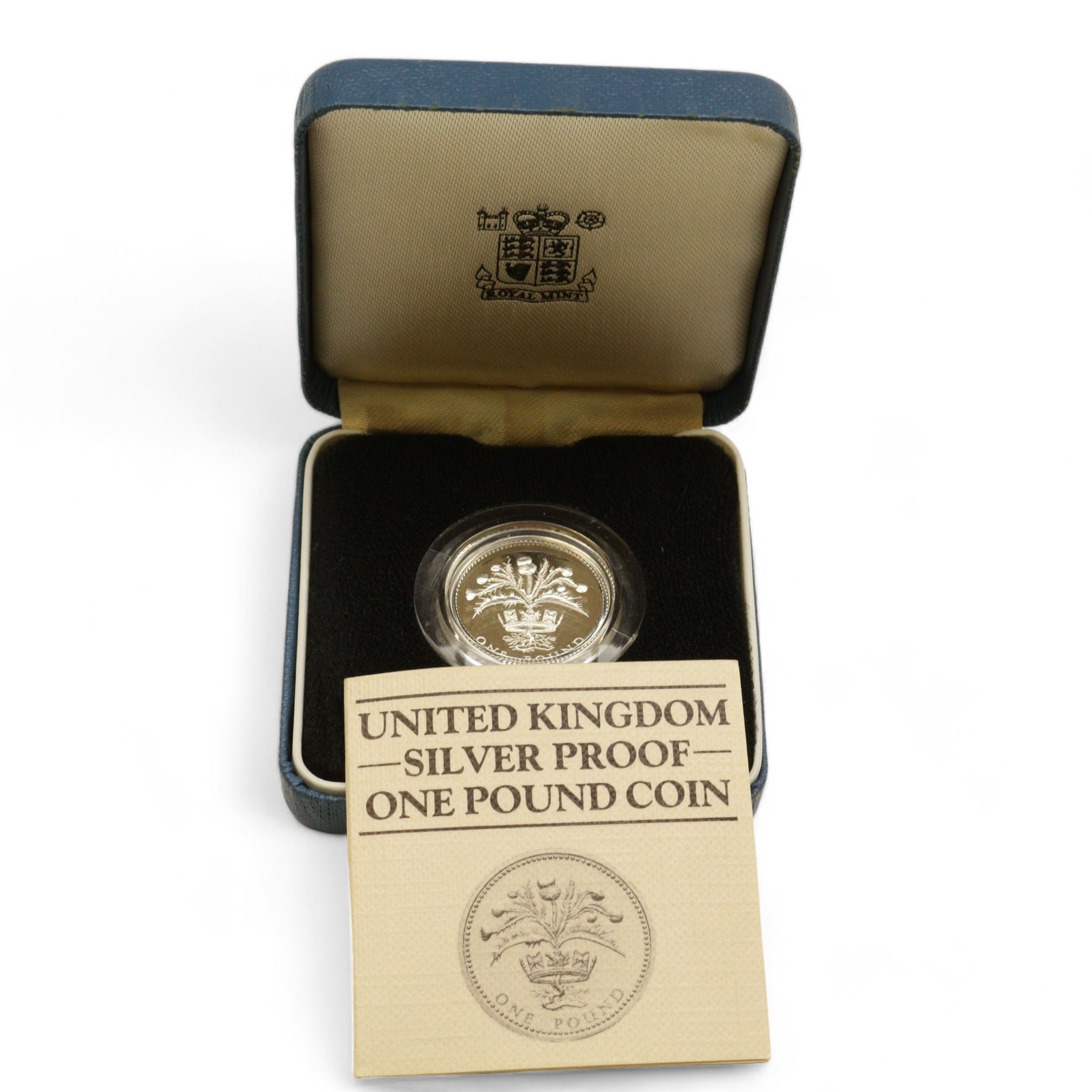 Eight The Royal Mint United Kingdom silver proof coins, comprising 1980 '80th Birthday' crown, 1981 'His Royal Highness The Prince Of Wales And Lady Diana Spencer' crown, 1984, 1985, 1986 and 1987 one pounds, all cased with certificates and a 1977 crown cased no certificate (8)