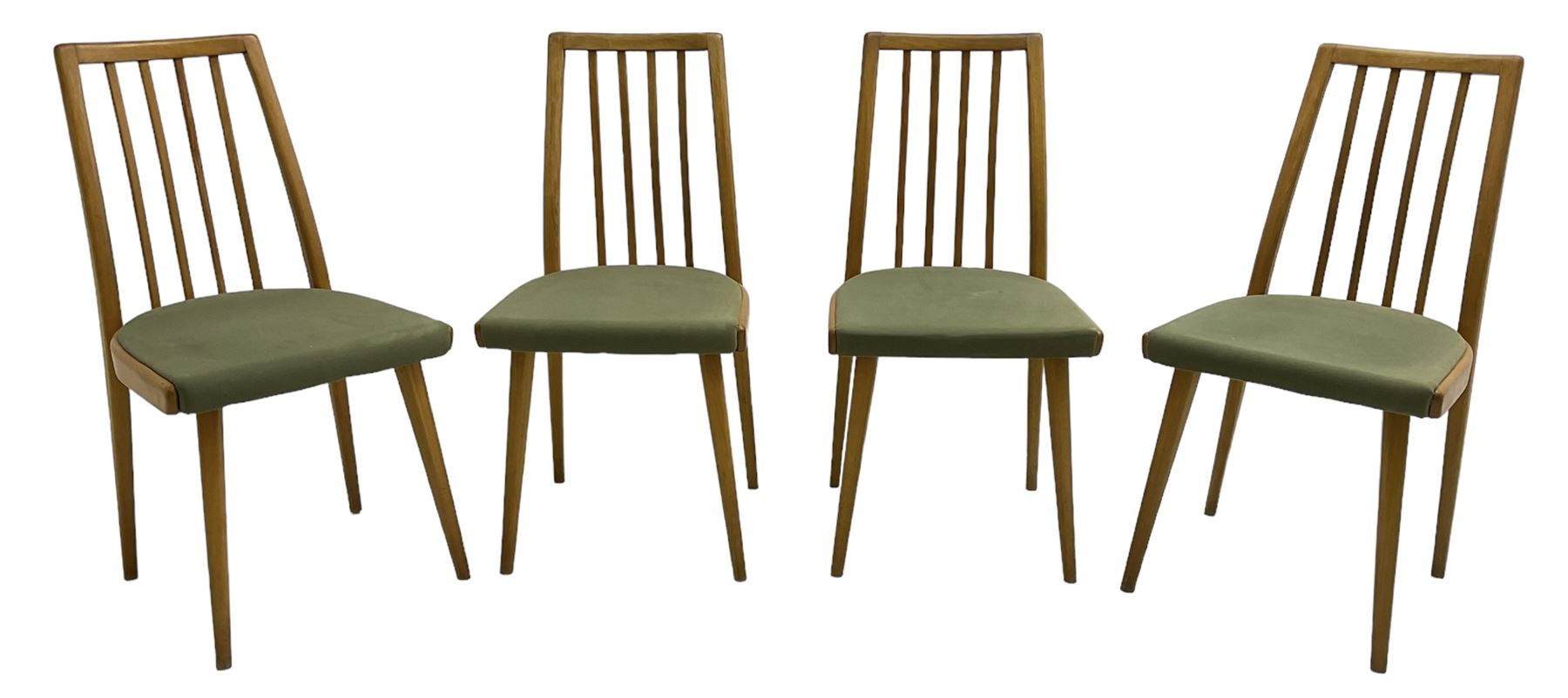 Set of four mid-20th century beech framed dining chairs, vertical slat back over upholstered seats, on tapering supports