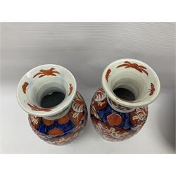 Pair of Japanese Imari vases with floral decoration, together with two Imari shell dishes etc, vases H24cm