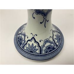 Pair of Delft blue and white vases, of elongated baluster form with shaped fluted rim, one depicting a Dutch sailing scene, the other a Dutch windmill scene, with painted mark beneath, H35.5cm