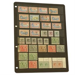 West Indies - Antigua, Bahamas with War Tax overprints, Bahamas postal stationary, British Guiana, British Honduras, Virgin Islands, Cayman Islands, Dominica, Grenada, Jamaica etc, housed on pages in a ring binder folder