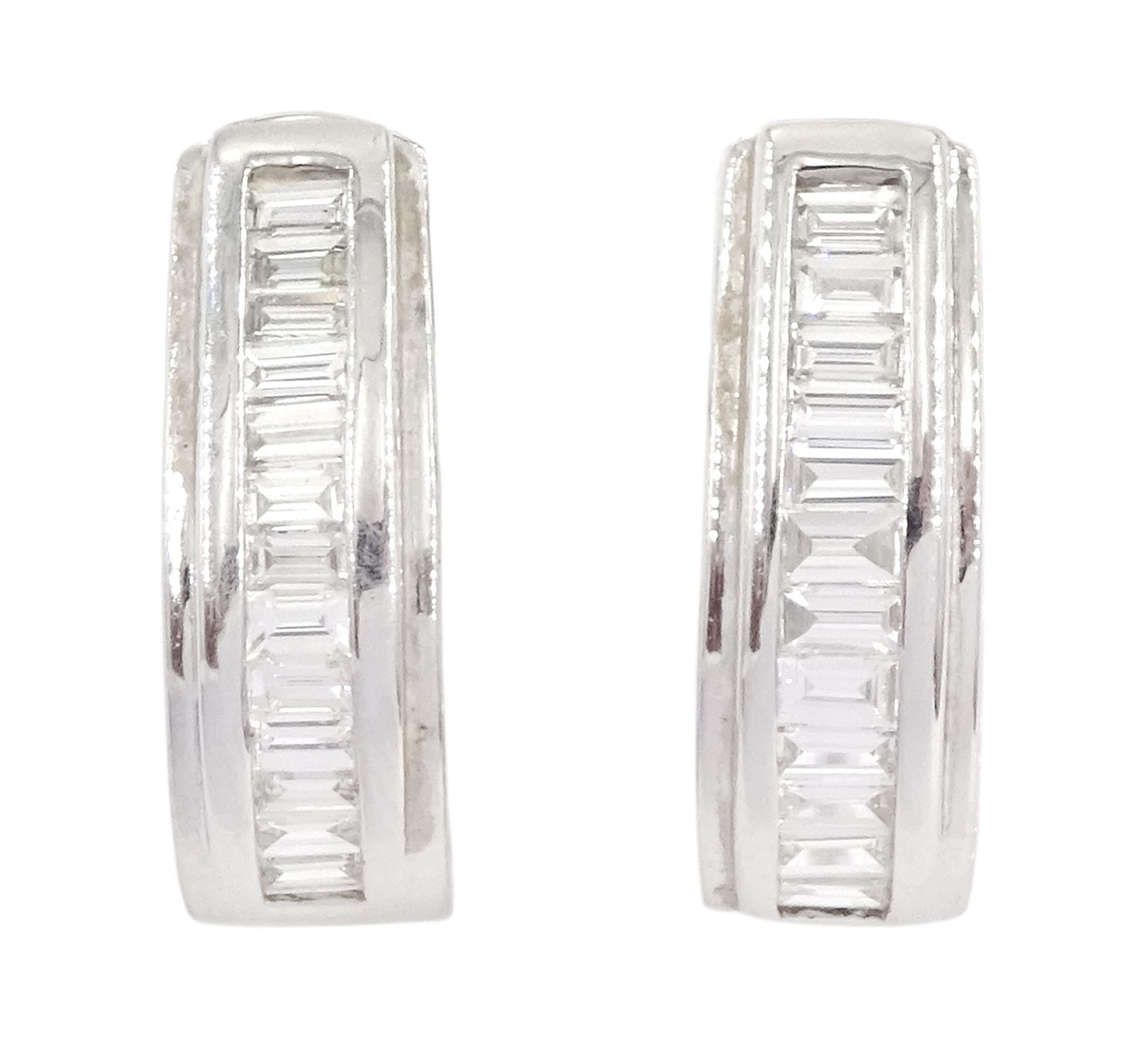 Pair of 18ct white gold channel set, baguette cut diamond half hoop earrings, total diamond weight approx 0.50 carat