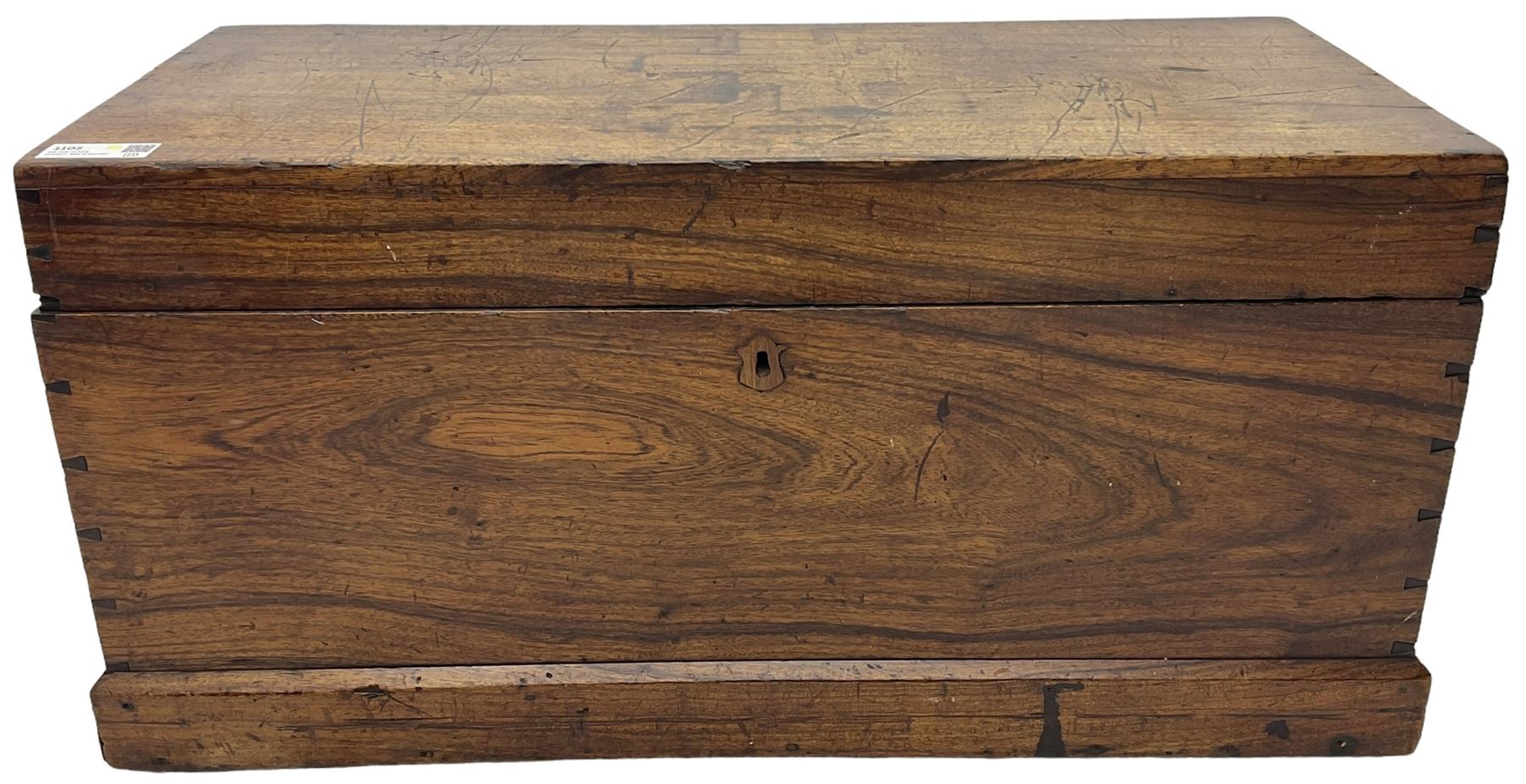 19th century teak blanket chest, hinged lid over plain front, fitted with brass carrying handles on plinth base 