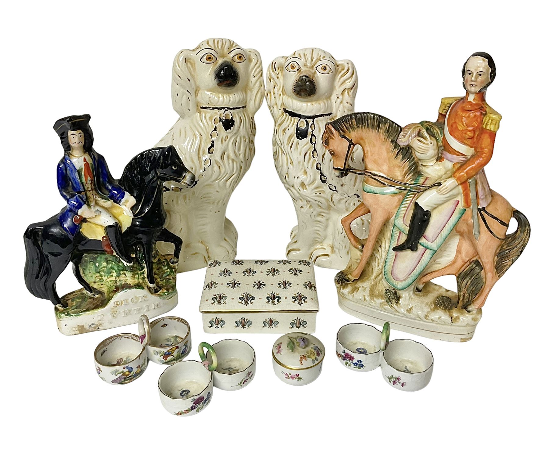 Staffordshire figure of the Duke of Wellington on a bay horse, H30cm in red uniform, together with a similar Staffordshire figure of Dick Turpin, pair of Staffordshire style dogs, H27cm, three Meissen style double salts and two trinket boxes 