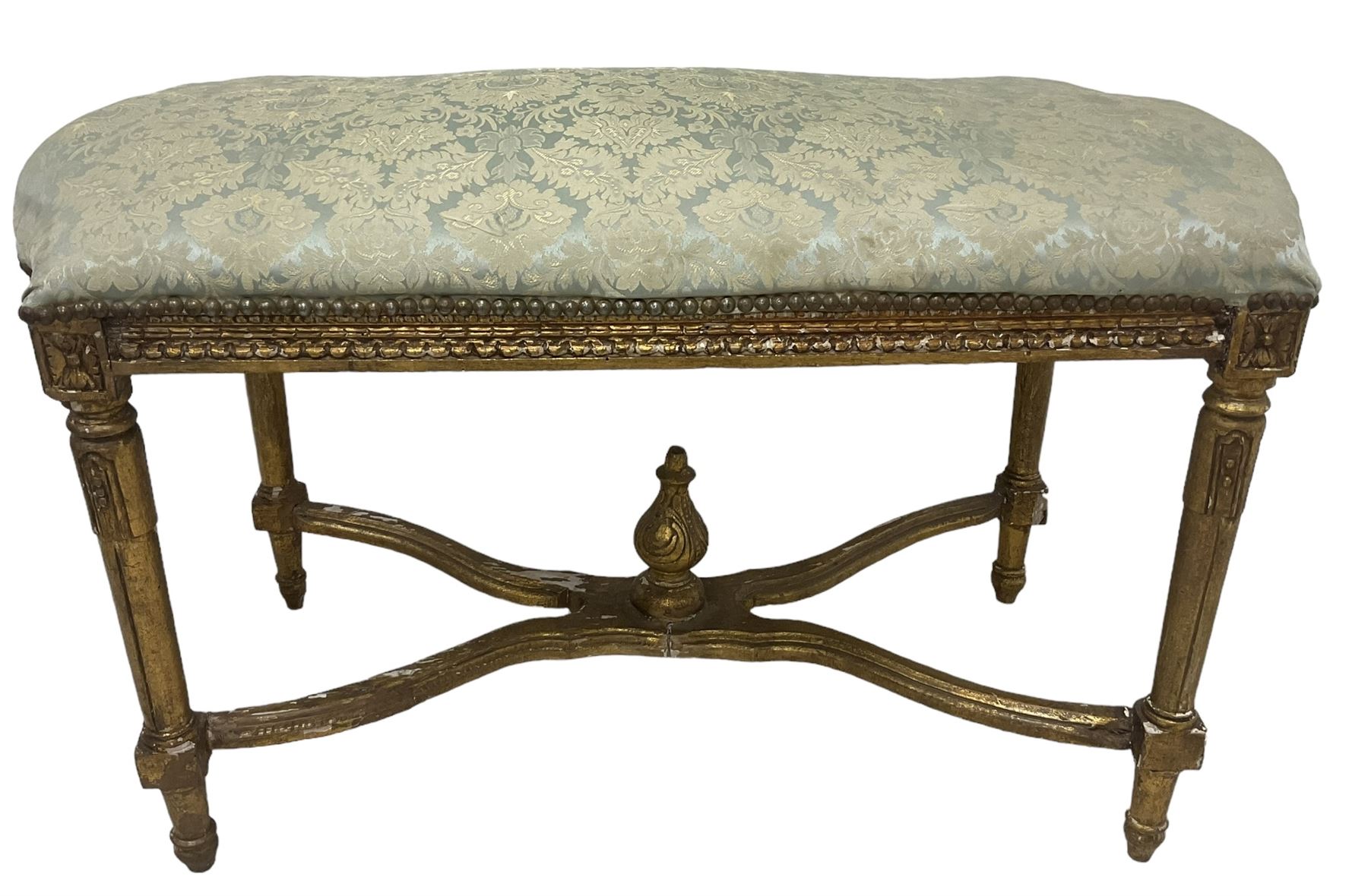 French Louis XIV design giltwood framed bench or window seat, sprung seat upholstered in pale blue foliate damask fabric with studwork border, raised on gesso moulded and carved tapering supports united by curved X-stretcher, with central acanthus carved finial